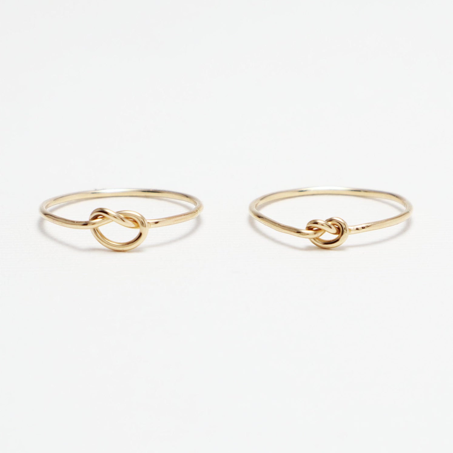 The 2 Unity Knot Rings