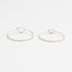 The 2 Unity Knot Twist Rings