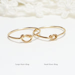 The 2 Unity Knot Rings