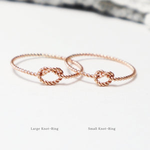 The 2 Unity Knot Twist Rings