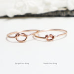 The 2 Unity Knot Rings